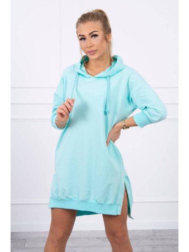 Dress with a hood and a longer back mint