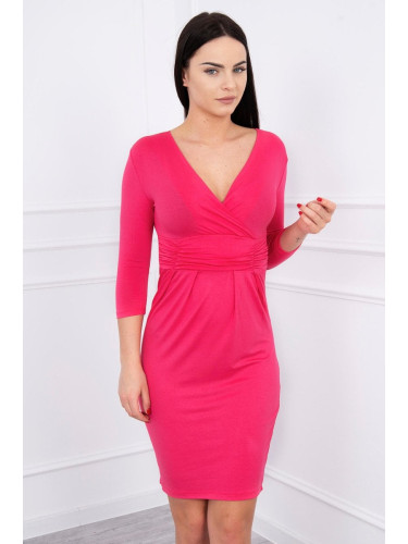 Fitted dress with a cut-out under the bust in fuchsia color