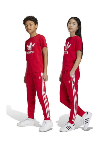 Детски спортен панталон adidas Originals SST TRACK PANTS в червено с апликация IX7631