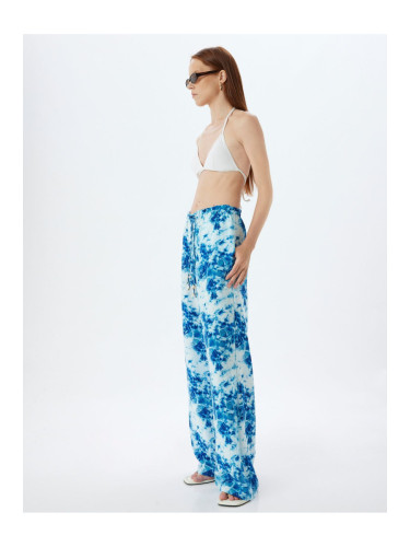 Koton X Şahika Ercümen - Viscose Trousers with Batik Pattern and Wide Leg