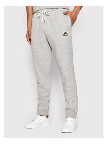 adidas Долнище анцуг Essentials Feel Comfy French Terry HE1857 Сив Regular Fit