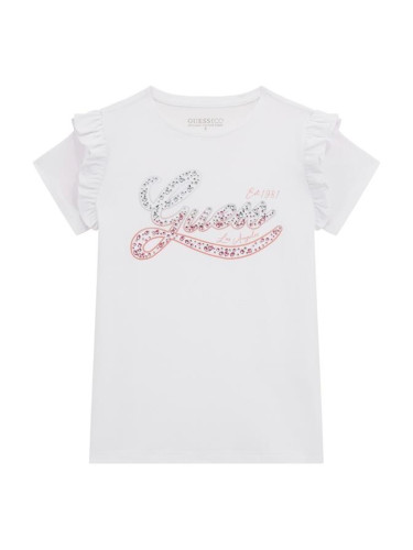 Детска тениска в бял цвят с камъчета и надпис Guess