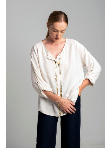 Ecru blouse with gold print