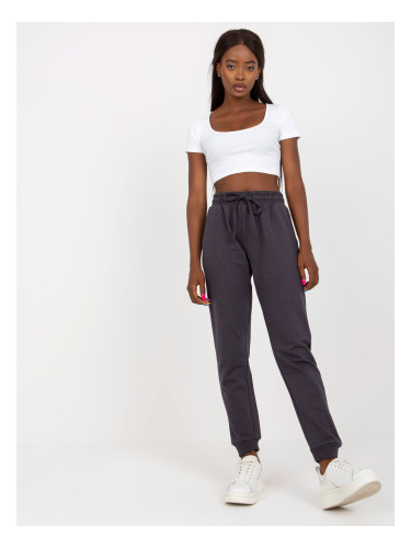 Graphite sweatpants tied at the waist