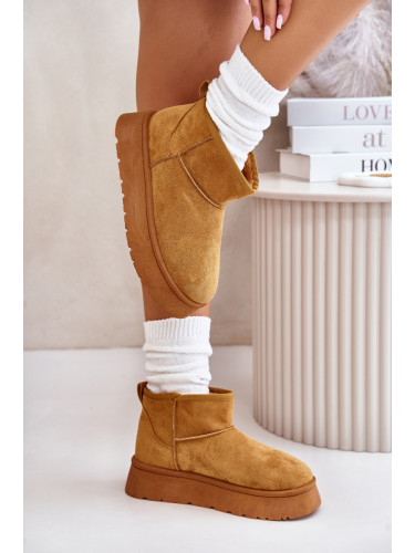 Low women's snow boots on a platform insulated with Camel Saldren fur