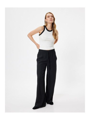 Koton Elastic Waist Tied Wide Leg Viscose Trousers with Pockets