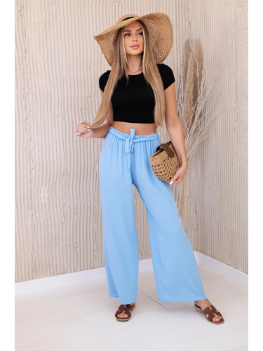 Blue trousers with a wide waist