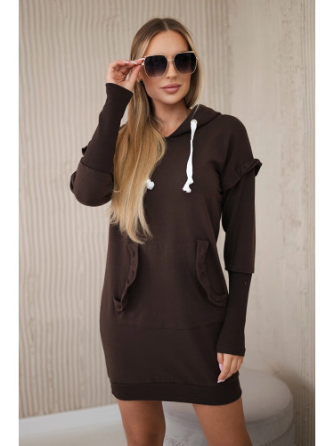 Brown dress with decorative ruffles and hood