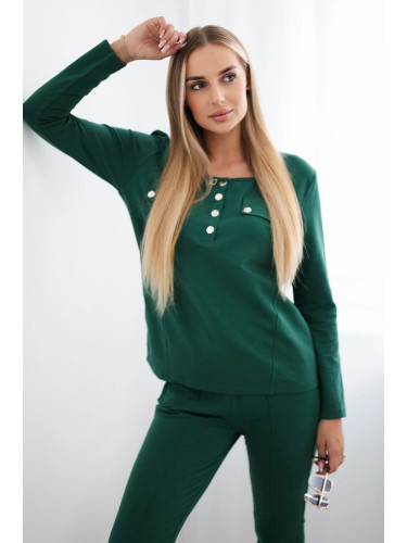 Set with a green press stud neckline