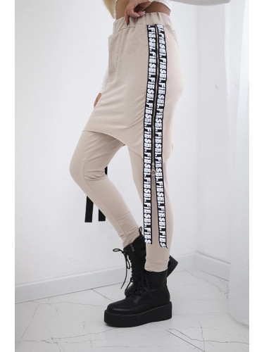 Pants/suit with beige selfie lettering