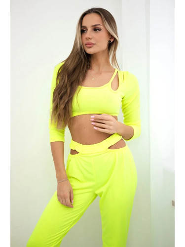 Complete with a yellow neon-colored blouse top