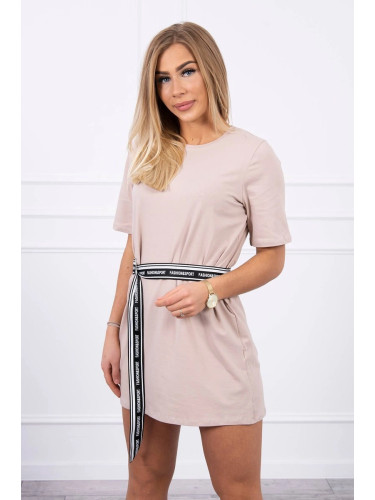 Dress with decorative belt in beige color