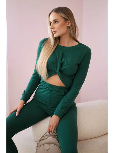 Set with ruffles on a green blouse