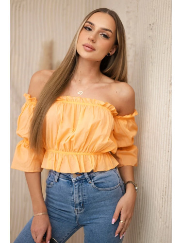 Peach blouse without shoulders