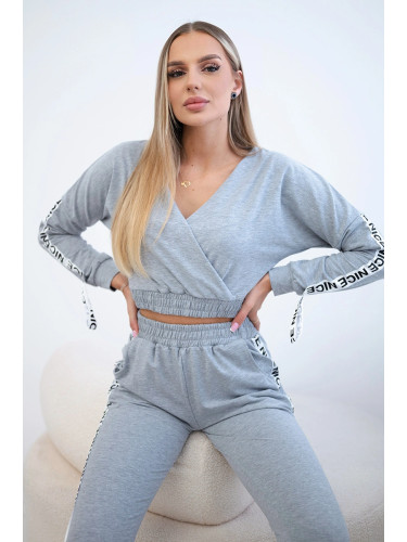 Set with decorative stripes in gray color