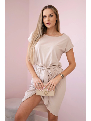 Tied dress with a clutch bottom in beige color