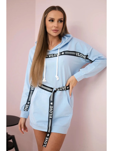 Dress decorated with a tape with inscriptions cyan