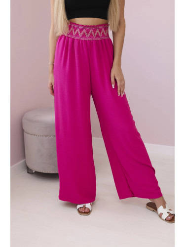 Trousers with a wide elastic waistband in fuchsia