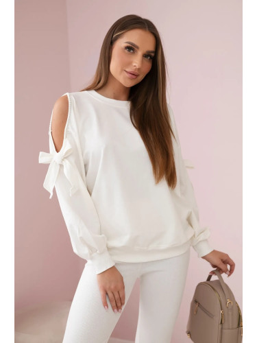 Set of sweatshirt with bow on sleeves and ecru leggings