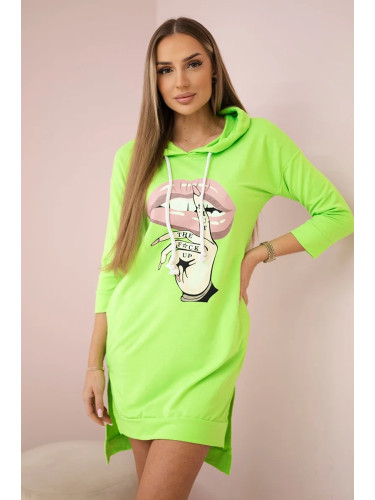 Dress with a longer back and a colorful green neon print