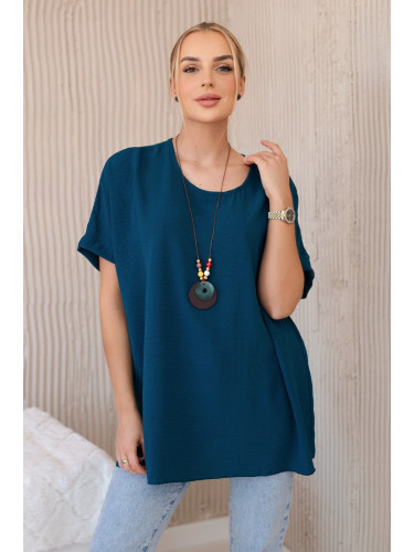 Oversized blouse with nautical pendant