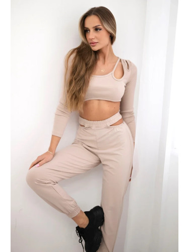Complete with a beige blouse top