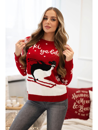 Red sweater with a Christmas motif