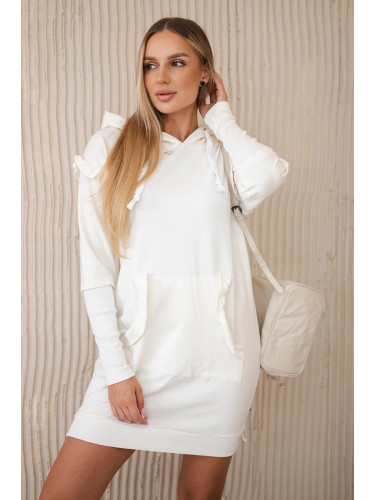 Dress with decorative ruffles and hood in ecru