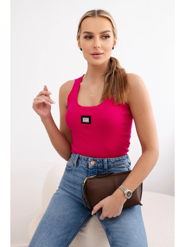 Striped blouse with fuchsia-colored metal plate