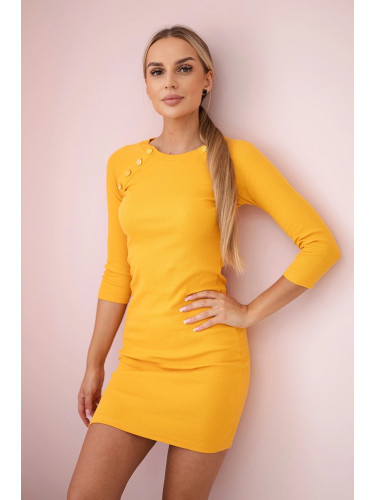 Dress with decorative mustard buttons