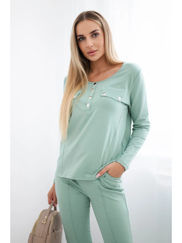 Set with a neckline with press studs dark mint
