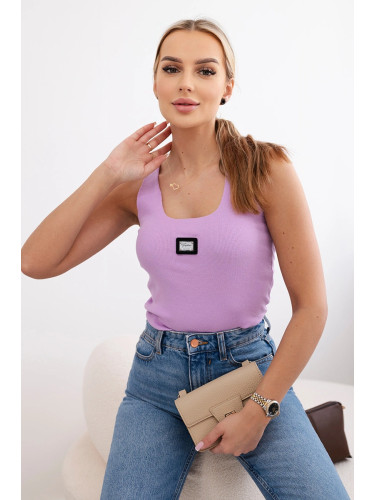 Striped blouse with a purple metal plate