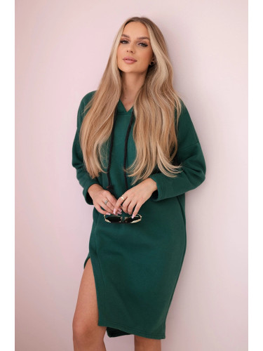Dress with a hood and a slit on the side green