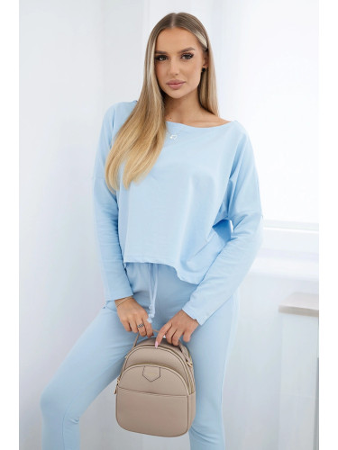 Set with an oversized blouse in azure color