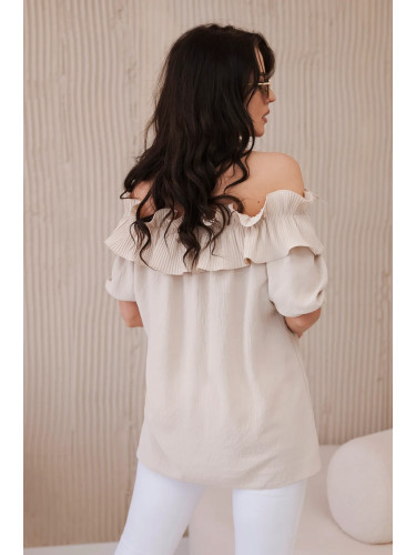 Spanish blouse with a decorative ruffle in beige color