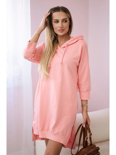 Dress with a hood and a longer back part apricot