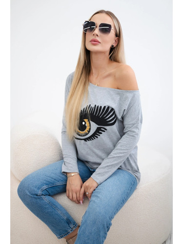 Printed blouse with a longer back in grey