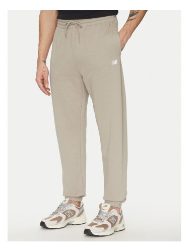 New Balance Долнище анцуг Essentials MP41519 Бежов Relaxed Fit