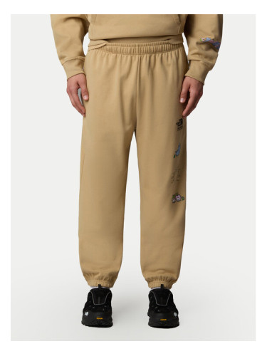 The North Face Долнище анцуг Unisex Mountain Cleanup NF0A8C2W Бежов Relaxed Fit