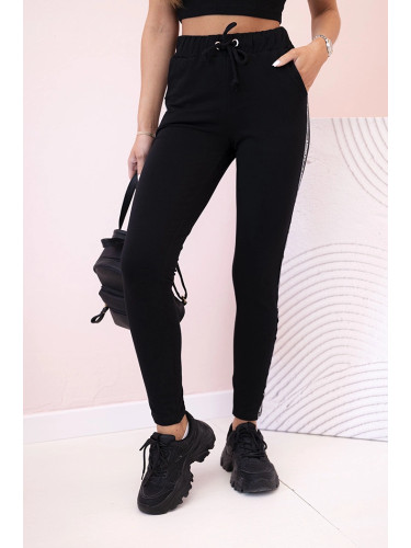 Kesi Women's sweatpants with side stripes and drawstring waist black