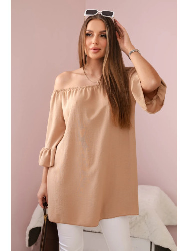 Spanish blouse with ruffles on a camel sleeve