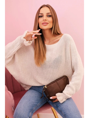 Kesi Włoski Women's mohair sweater with ruffled sleeves and a back cutout beige