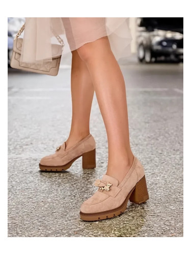 Resti Women's moccasins on a high post Nezii