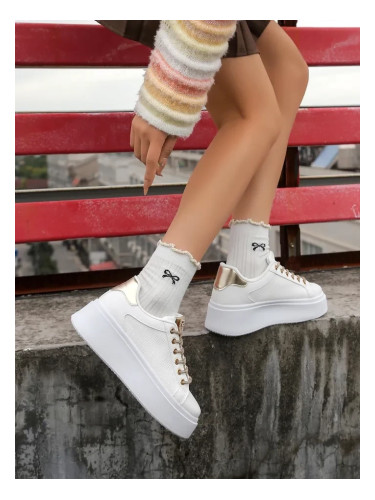 Resti Women's sporty sneakers with decorative laces Eone