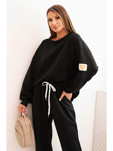 Kesi Włoski Ladies' butter set with a loose sweatshirt and pants with the word LOVE black