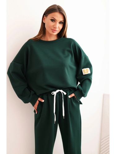 Kesi Włoski Women's set with a loose sweatshirt and pants with the word LOVE dark green