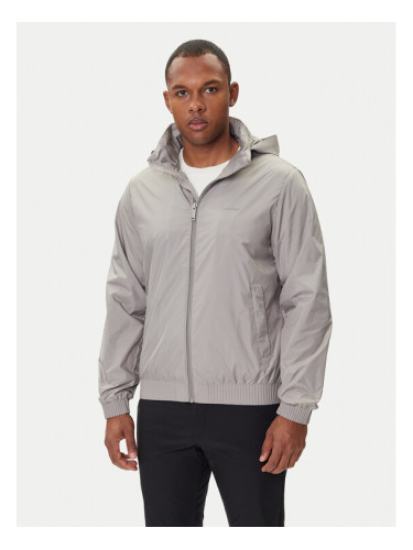 Calvin Klein Преходно яке LV04LC511G Бежов Relaxed Fit