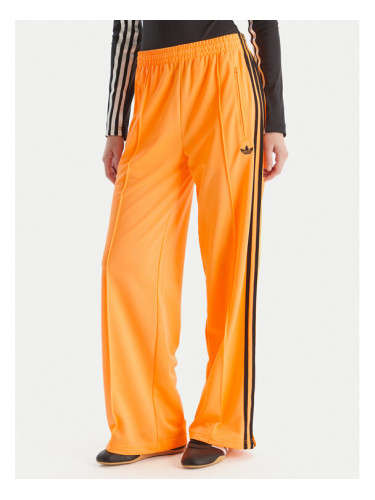 adidas Долнище анцуг adicolor Classic Firebird JY2694 Жълт Loose Fit