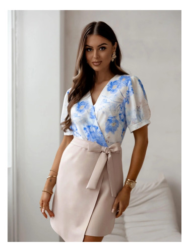 Resti Women's dress with a patterned floral top and an asymmetrical bottom with a waist belt