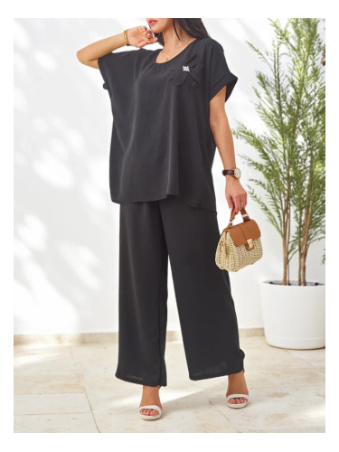 Resti Women's set with short sleeves, decorative flower, and wide pants